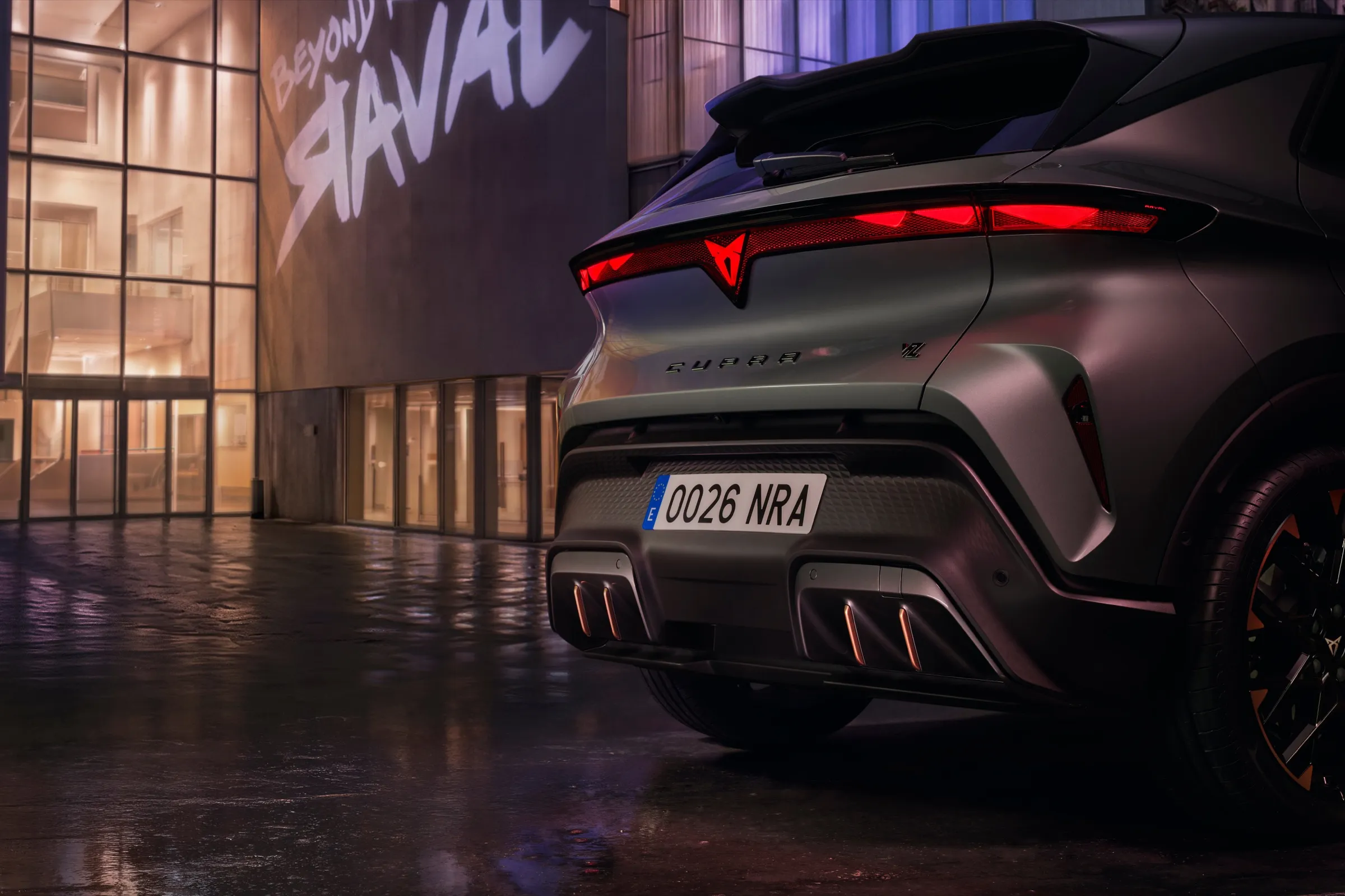Cupra Raval rear view with full-width light bar and quad diffuser
