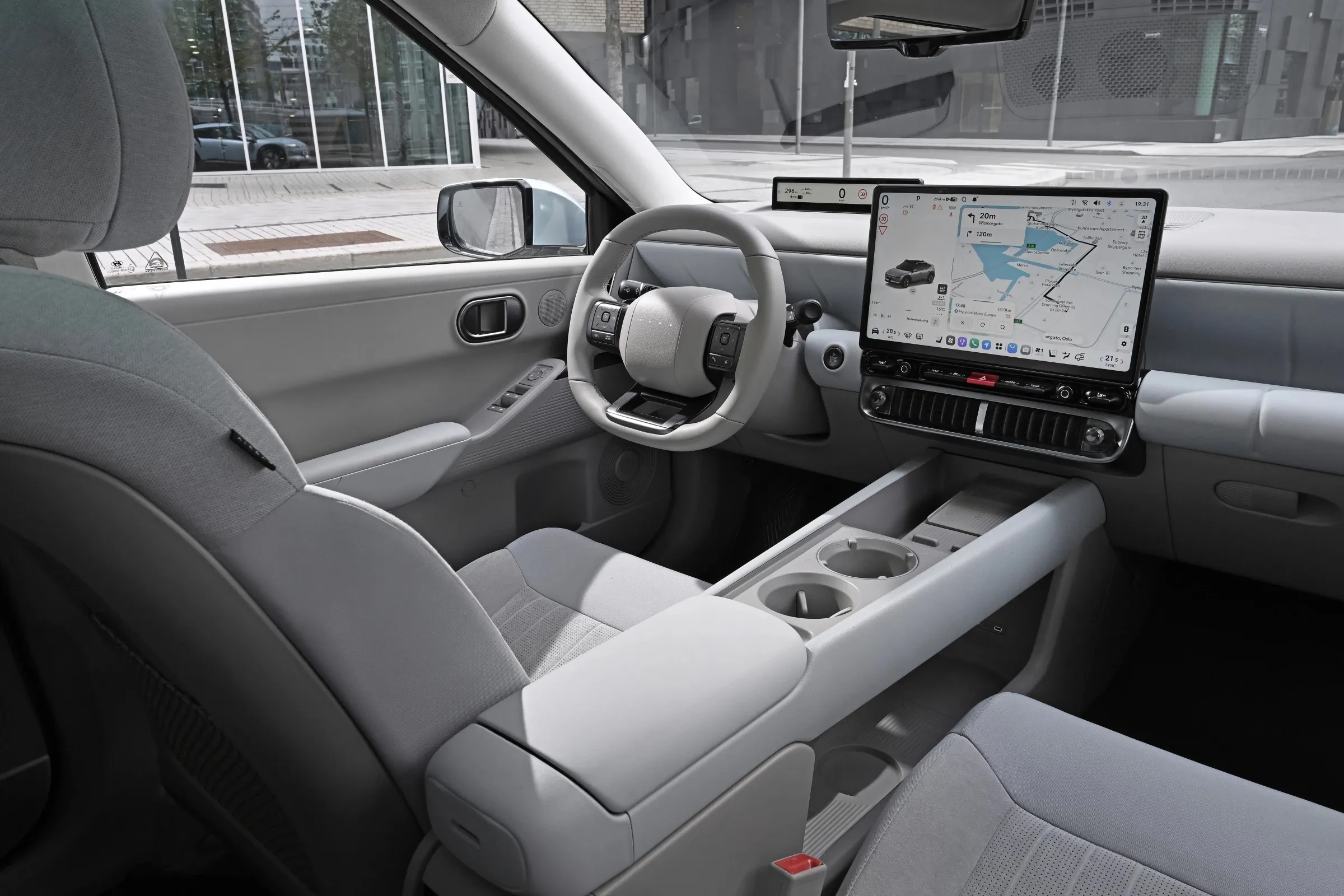 Hyundai Ioniq 3 front cabin with light grey upholstery
