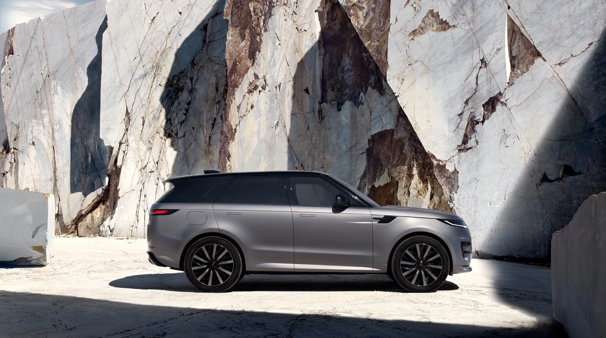 Range Rover Sport Electric side profile in a quarry