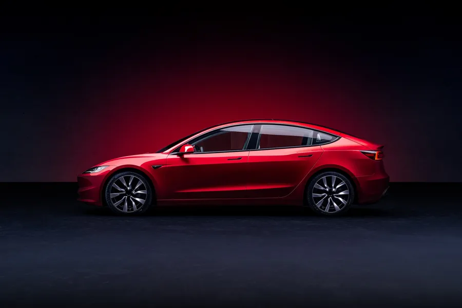 Red Tesla Model 3 Premium side profile