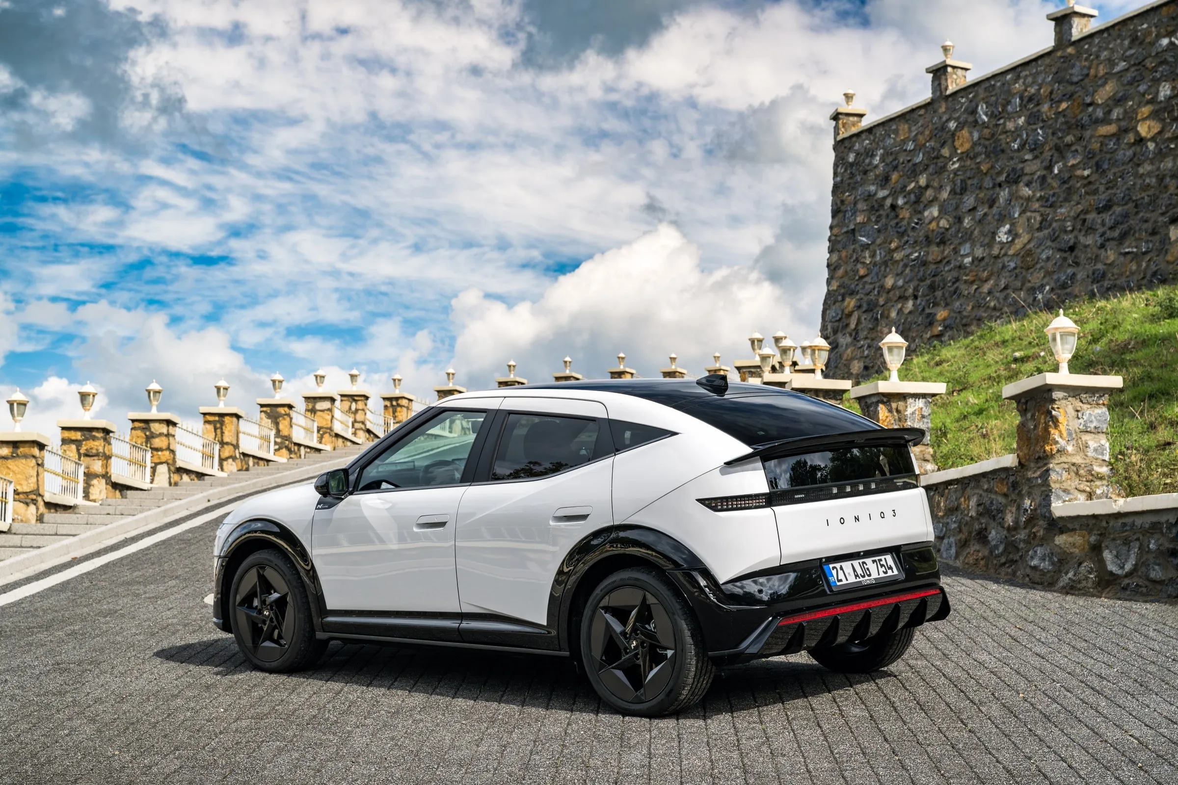 White Hyundai Ioniq 3 N Line, rear three-quarter view with red accents